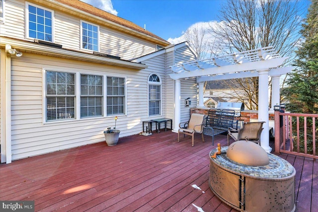 wooden deck with a pergola