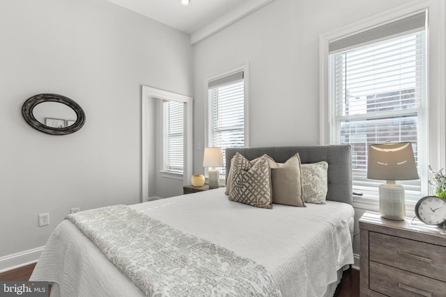 bedroom featuring dark hardwood / wood-style flooring