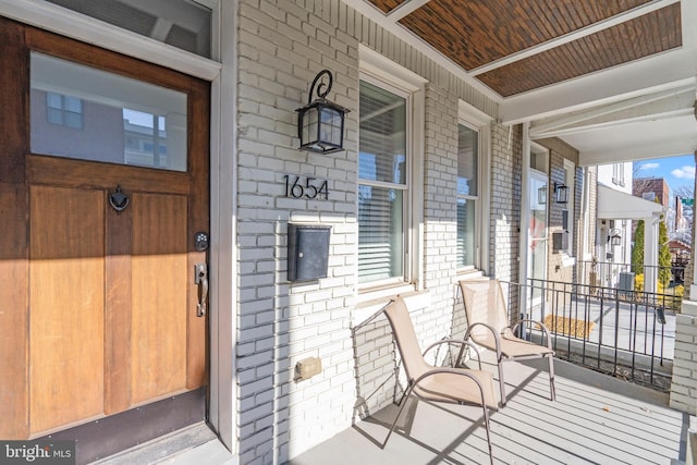 property entrance with a porch