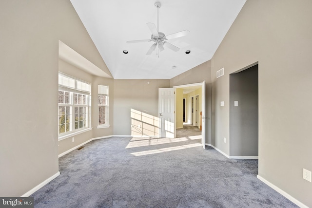 unfurnished living room with carpet floors, high vaulted ceiling, and ceiling fan