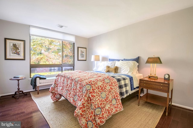 bedroom featuring dark hardwood / wood-style floors