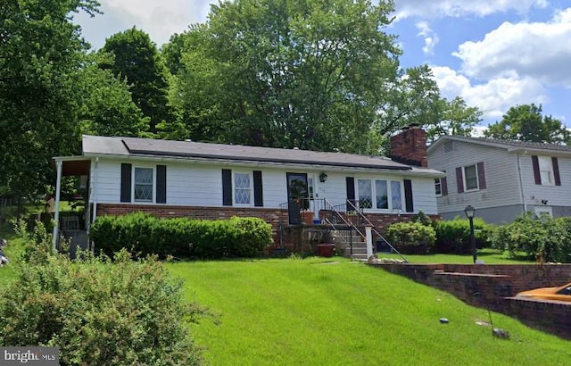 view of front facade featuring a front lawn