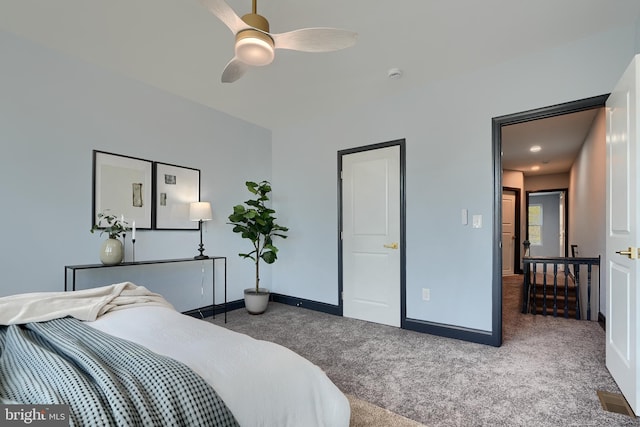 bedroom featuring ceiling fan and carpet flooring