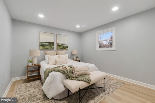 bedroom featuring hardwood / wood-style flooring