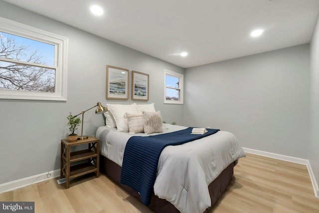 bedroom featuring light wood-type flooring