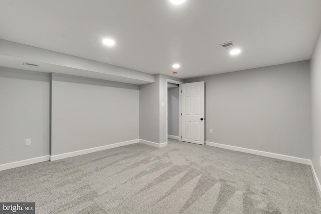 basement with light carpet