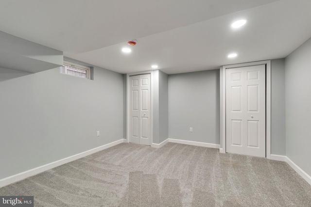 basement with light carpet