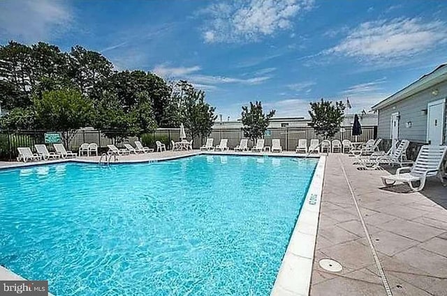 view of pool with a patio area