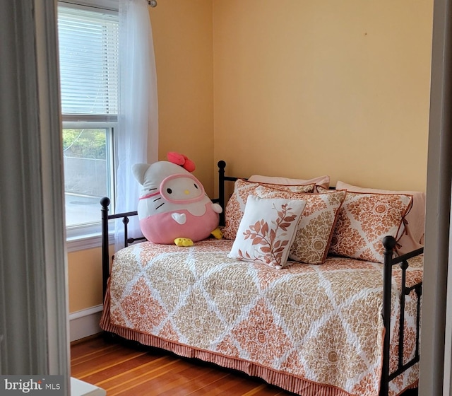 bedroom featuring wood-type flooring