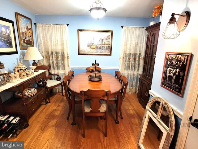 dining room with hardwood / wood-style floors