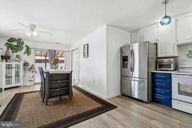 kitchen with light wood-type flooring, blue cabinetry, white range with electric stovetop, stainless steel fridge with ice dispenser, and white cabinets