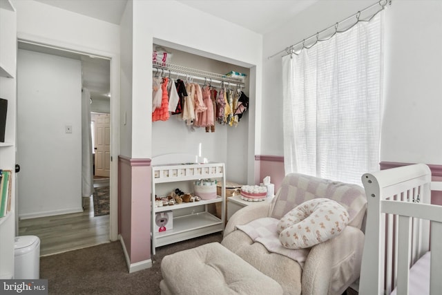 carpeted bedroom with a closet