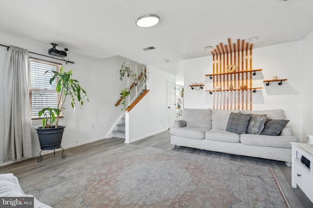 living room featuring dark hardwood / wood-style floors