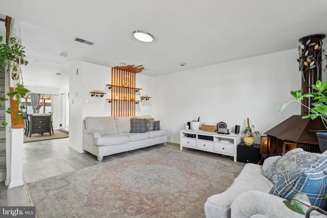 living room with hardwood / wood-style flooring