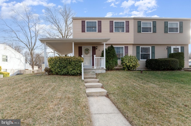 view of front of house with a front lawn