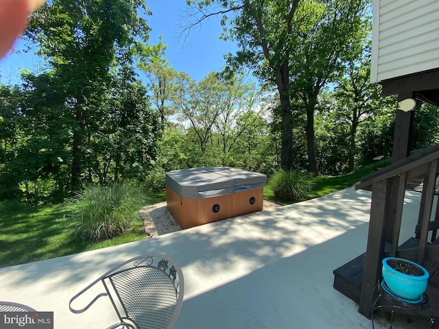 view of patio with a hot tub