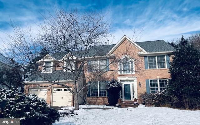 colonial home featuring a garage