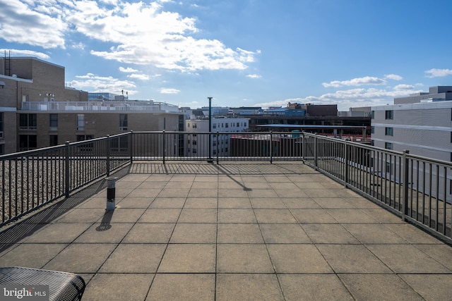 view of patio / terrace with a balcony