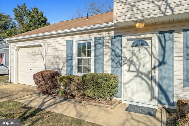 entrance to property featuring a garage