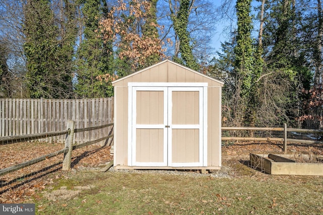 view of outbuilding featuring a yard