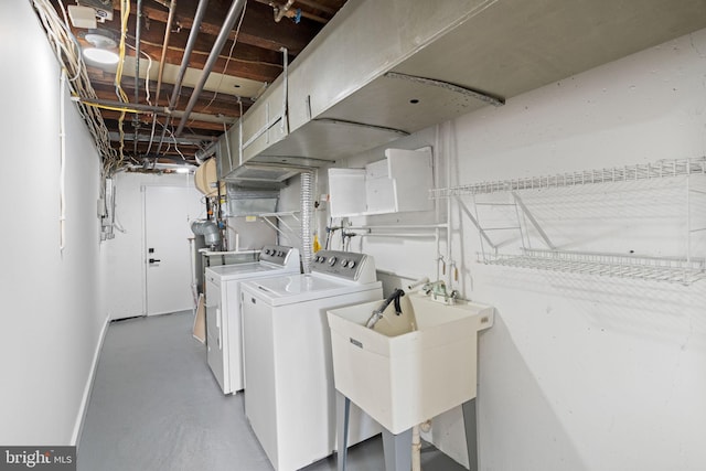 laundry room with sink and independent washer and dryer