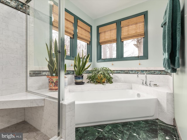 bathroom featuring a garden tub