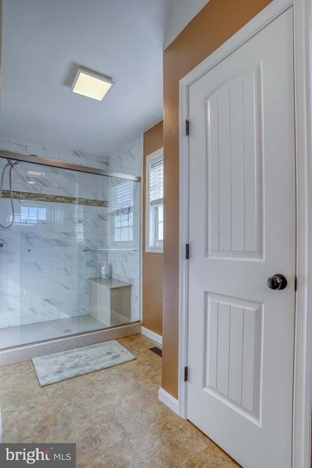 bathroom featuring walk in shower