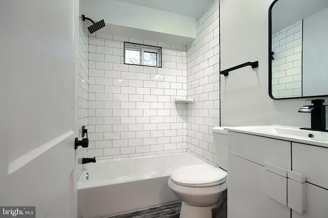 full bath with vanity, shower / tub combination, and toilet