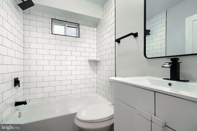 bathroom with toilet, shower / bathtub combination, and vanity