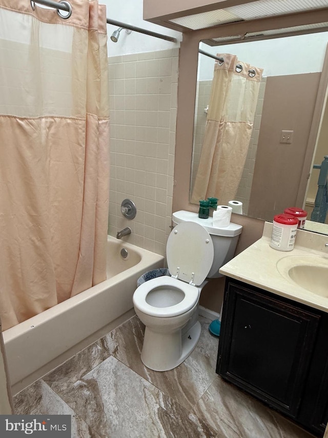 full bathroom with shower / tub combo, vanity, and toilet