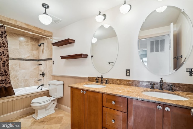 full bathroom with shower / bath combo, vanity, and toilet