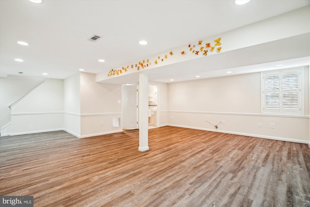 basement with light wood-type flooring