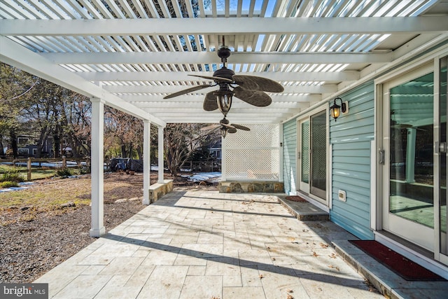 view of patio featuring ceiling fan and a pergola