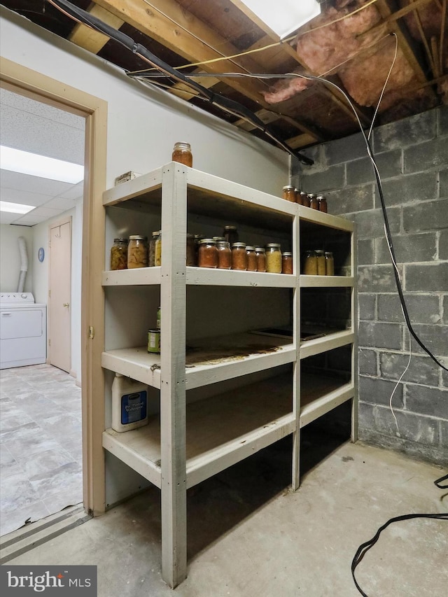 storage room featuring separate washer and dryer