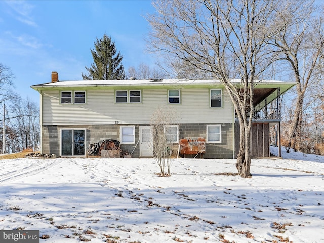 view of snow covered property