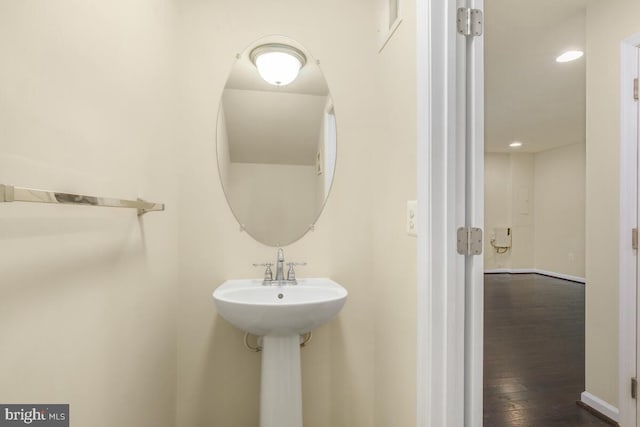 bathroom featuring hardwood / wood-style flooring