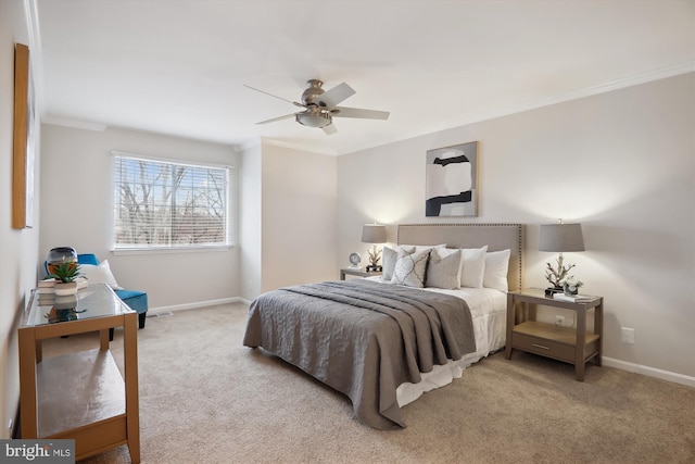 carpeted bedroom with crown molding and ceiling fan