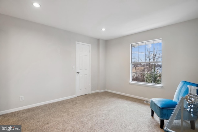 unfurnished room with carpet