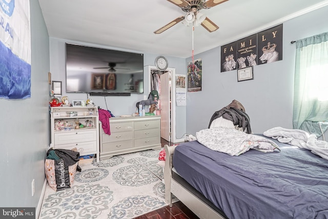 bedroom featuring ceiling fan