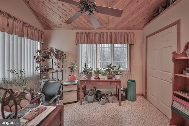 carpeted home office featuring ceiling fan, lofted ceiling, and wooden ceiling