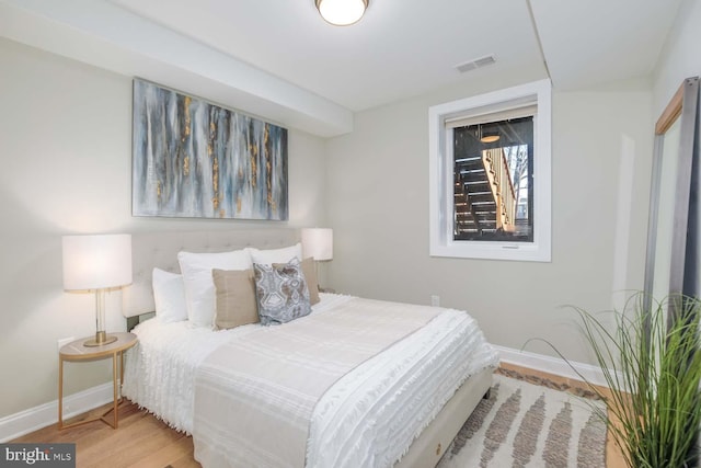 bedroom featuring hardwood / wood-style floors