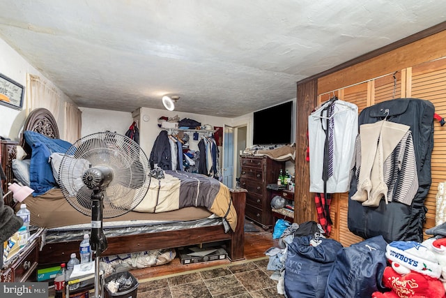 bedroom with stone finish flooring