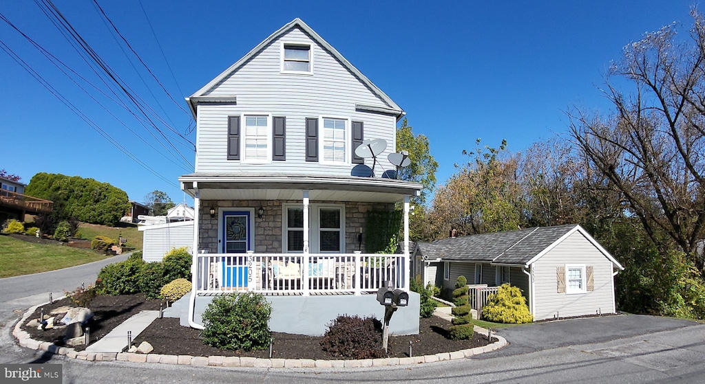 front facade featuring covered porch