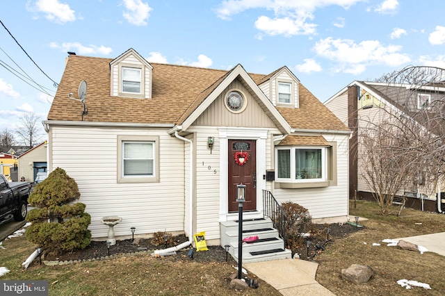 view of new england style home