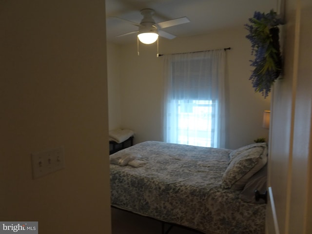 bedroom featuring ceiling fan