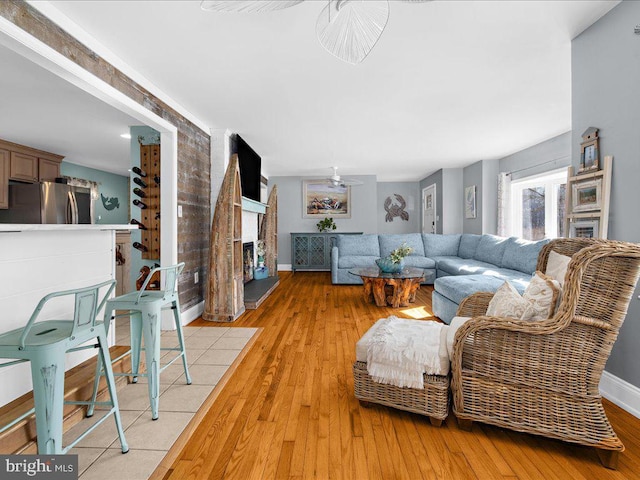 living room with light hardwood / wood-style flooring