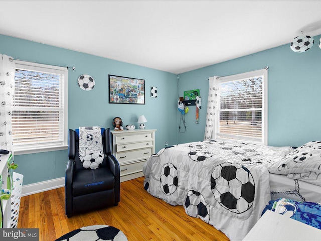 bedroom featuring light wood-type flooring