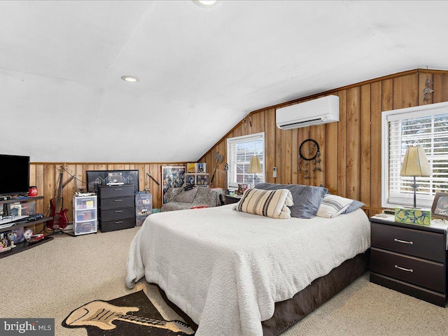 carpeted bedroom featuring lofted ceiling, wooden walls, and an AC wall unit