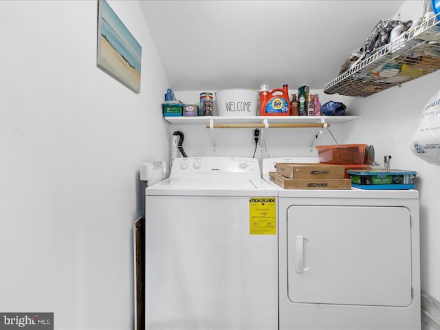 laundry area with washer and clothes dryer