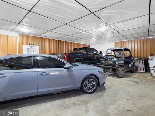 garage with wood walls